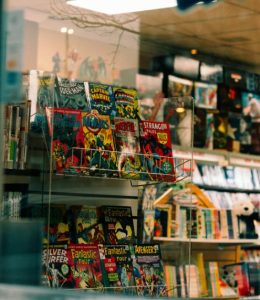 A vibrant comic panel showcasing a superhero in action, illustrating how superhero stories help teens with confidence.